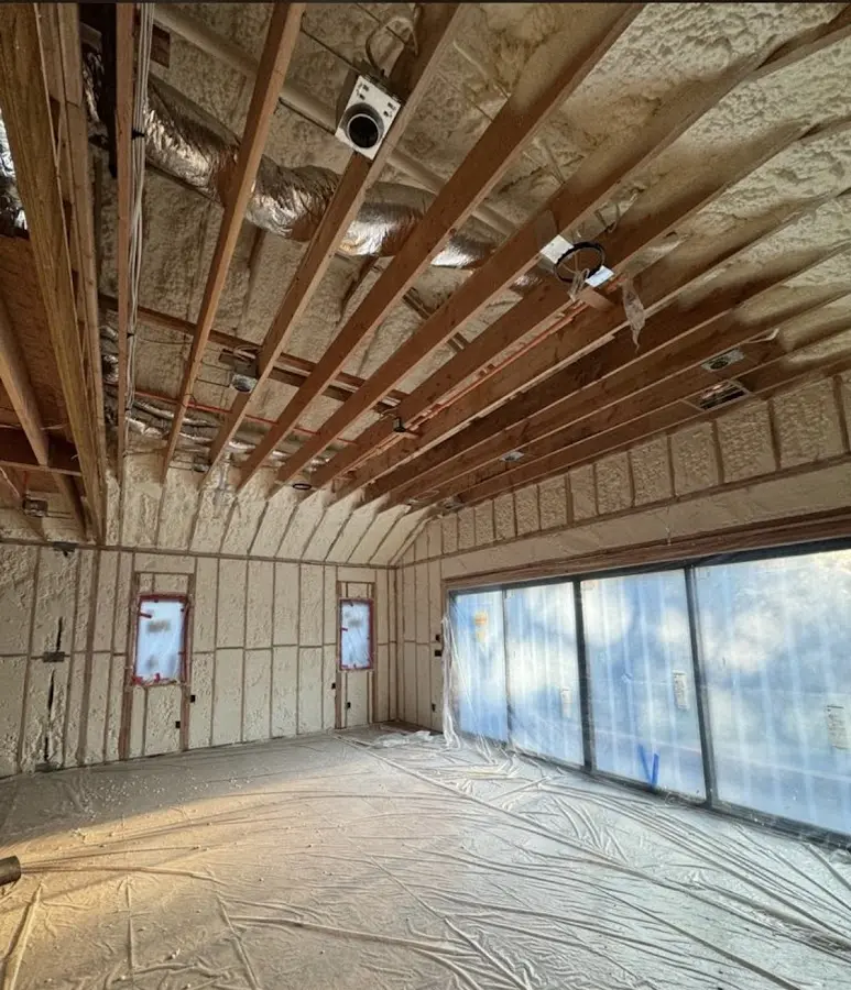 Interior walls and ceiling insulated with spray foam during new construction in Prosper